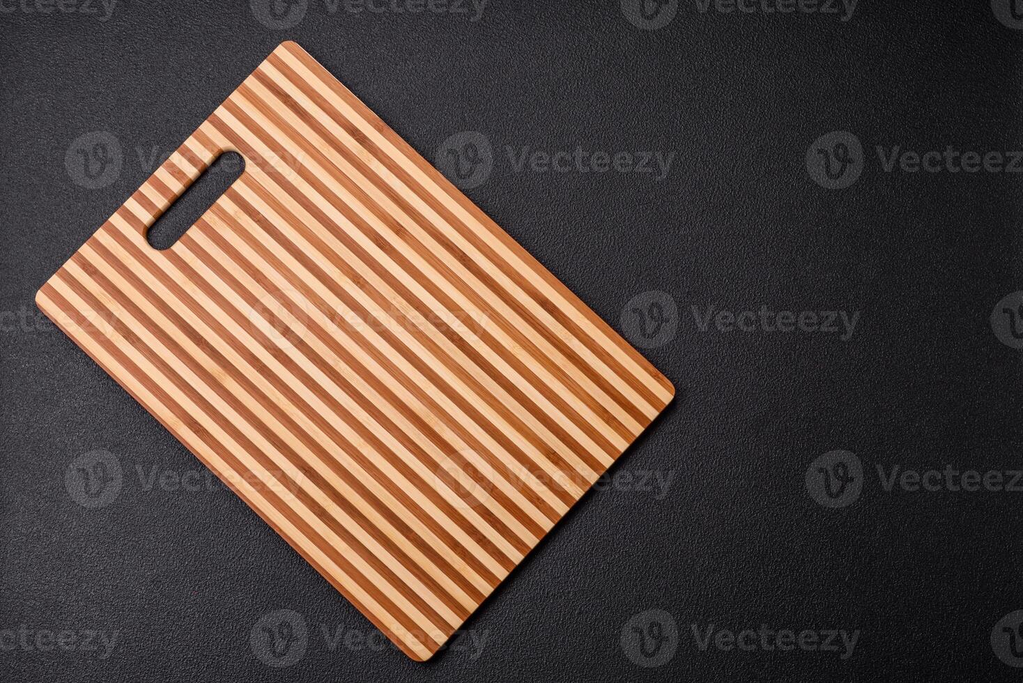 Empty rectangular wooden cutting board with copy space photo