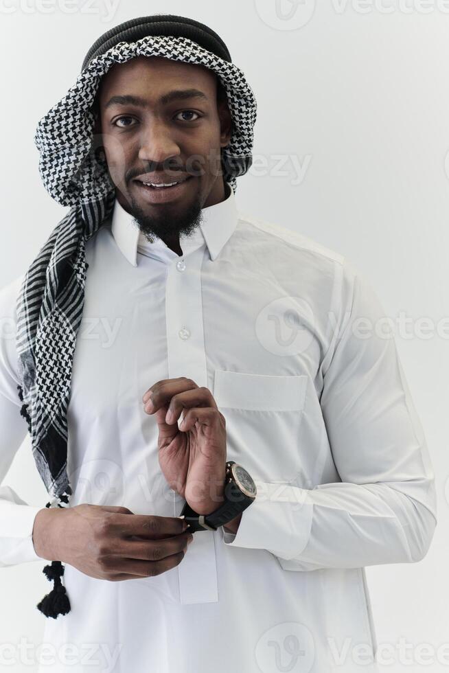 Arabic entrepreneur captures a self-portrait against an isolated white background, radiating ambition, determination, and corporate charisma, embodying the essence of a successful and influential photo