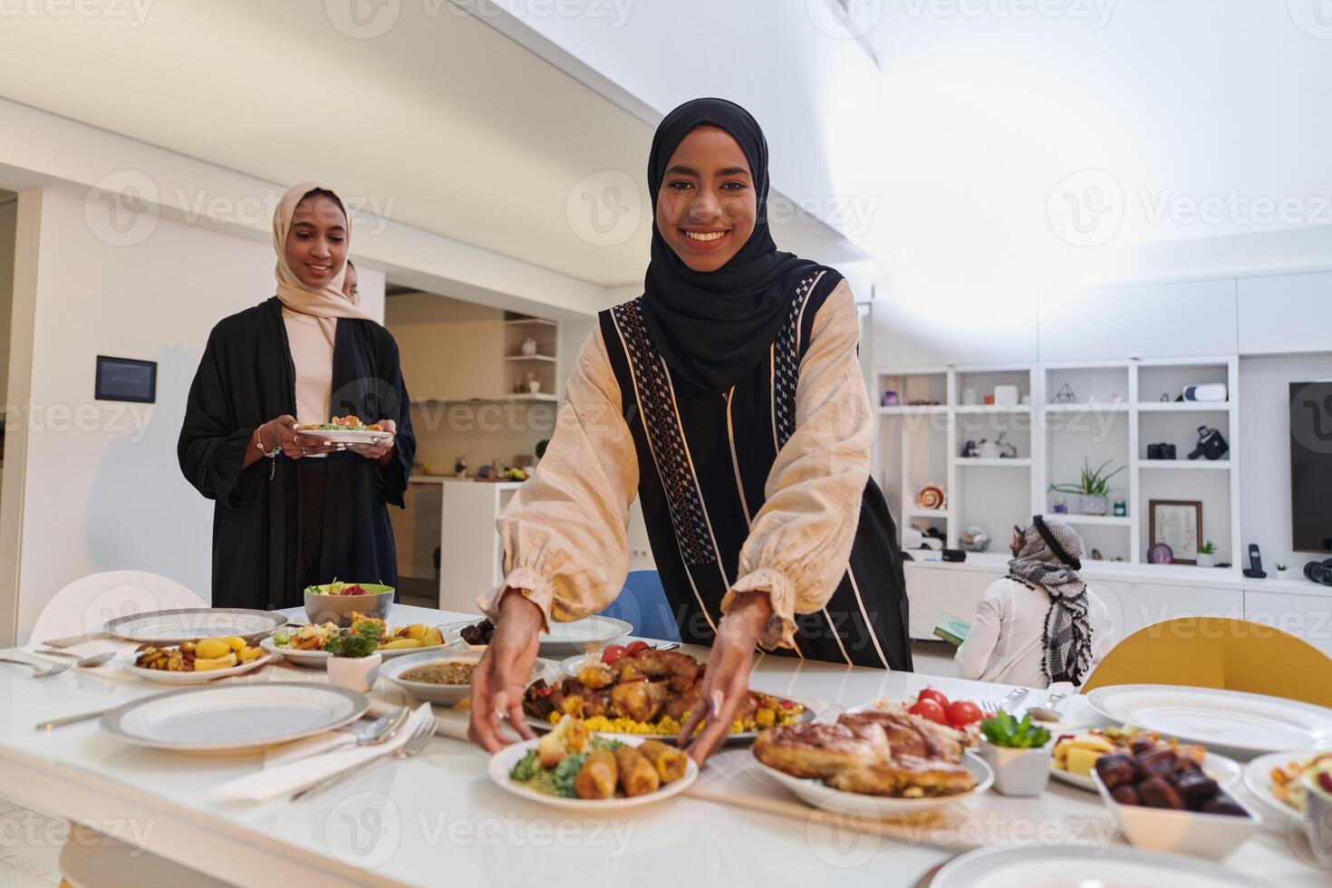 Group of young Arab women come together to lovingly prepare an iftar table during the sacred Muslim month of Ramadan, embodying the essence of communal unity, cultural tradition, and joyous photo