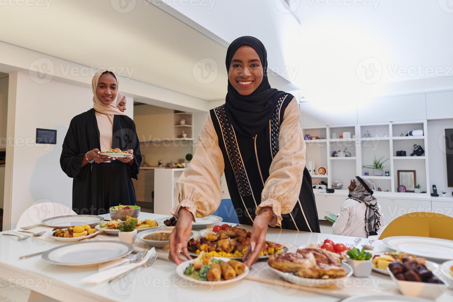 Group of young Arab women come together to lovingly prepare an iftar table during the sacred Muslim month of Ramadan, embodying the essence of communal unity, cultural tradition, and joyous photo