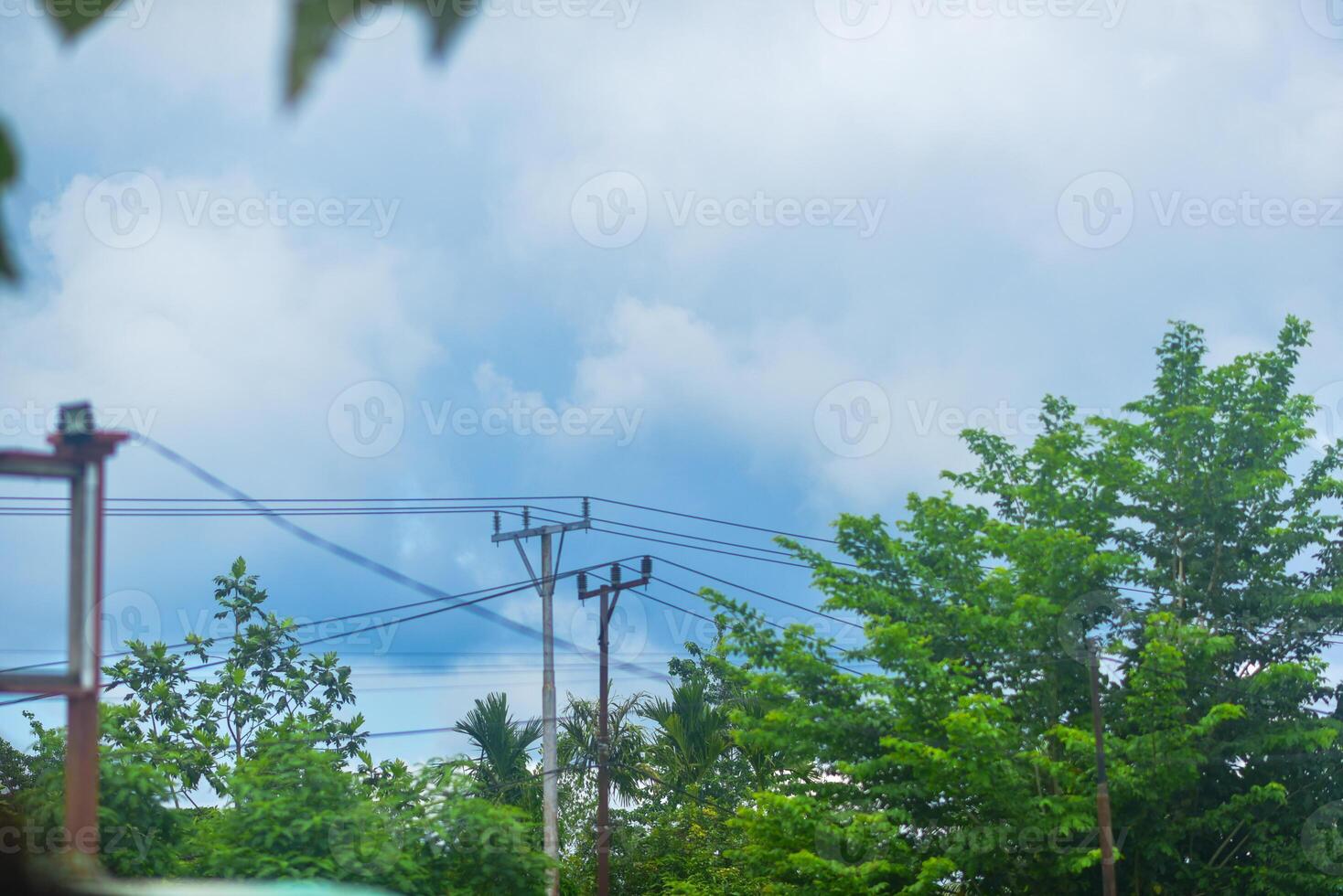 a red and white kite flying in the sky photo
