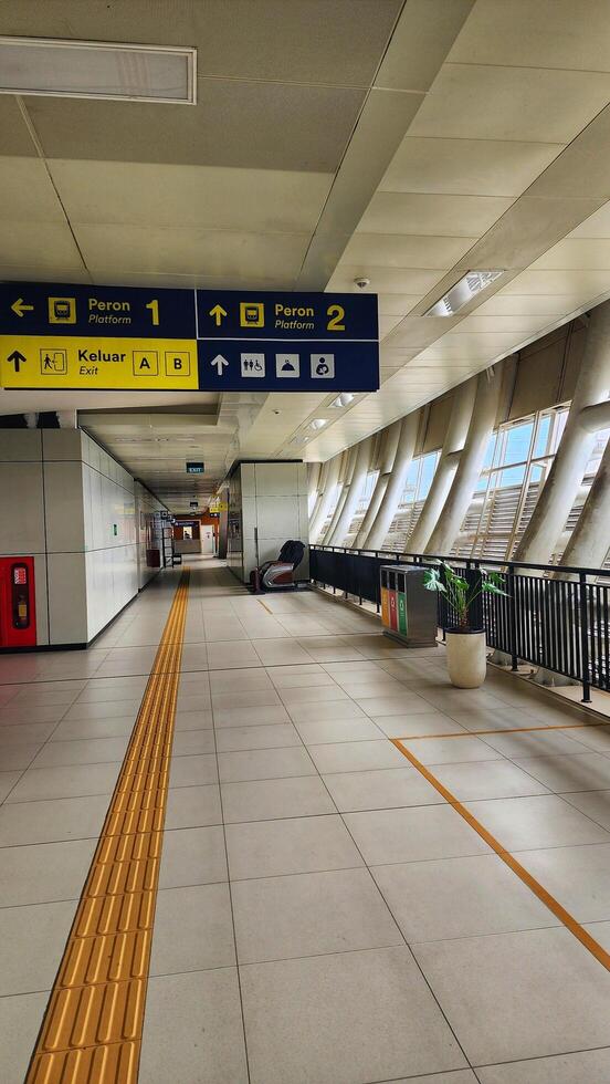an empty airport terminal with a sign that says departure photo