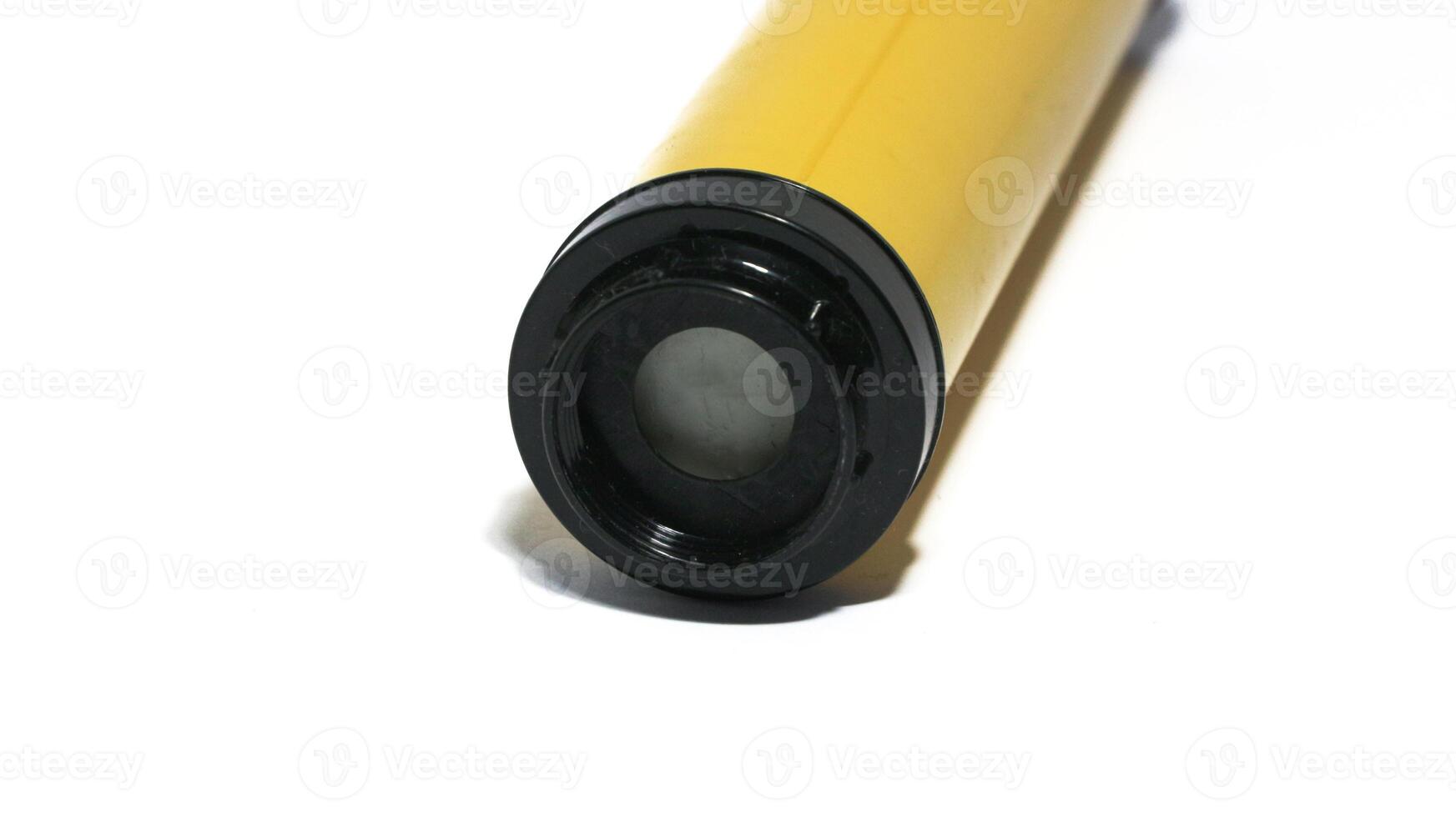 Yellow manual plastic vacuum pump isolated on white, the vacuum pump saves space in the trunk photo