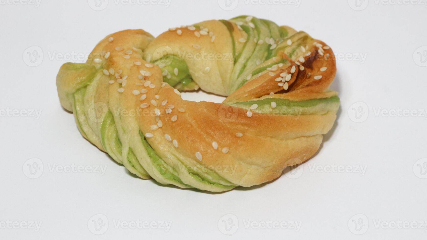 Indonesian bread stuffed with green beans isolated on white background. Selective focus photo