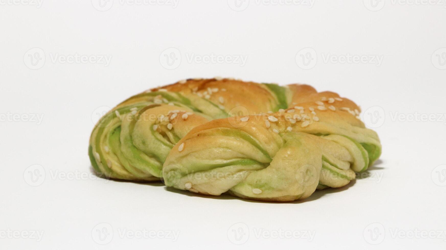 Indonesian bread stuffed with green beans isolated on white background. Selective focus photo