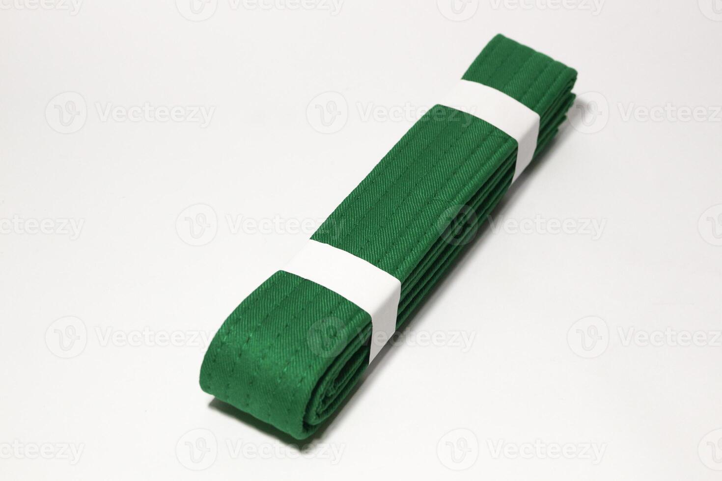 A picture of taekwondo belt on white background with selective focus photo