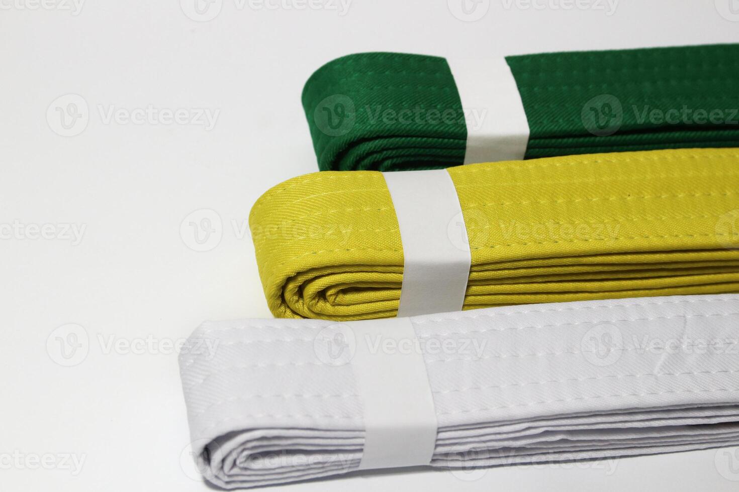 A picture of taekwondo belt on white background with selective focus photo