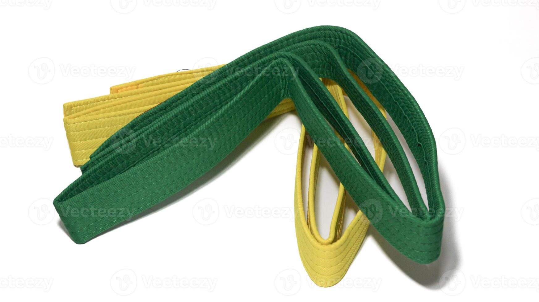 A picture of taekwondo belt on white background with selective focus photo