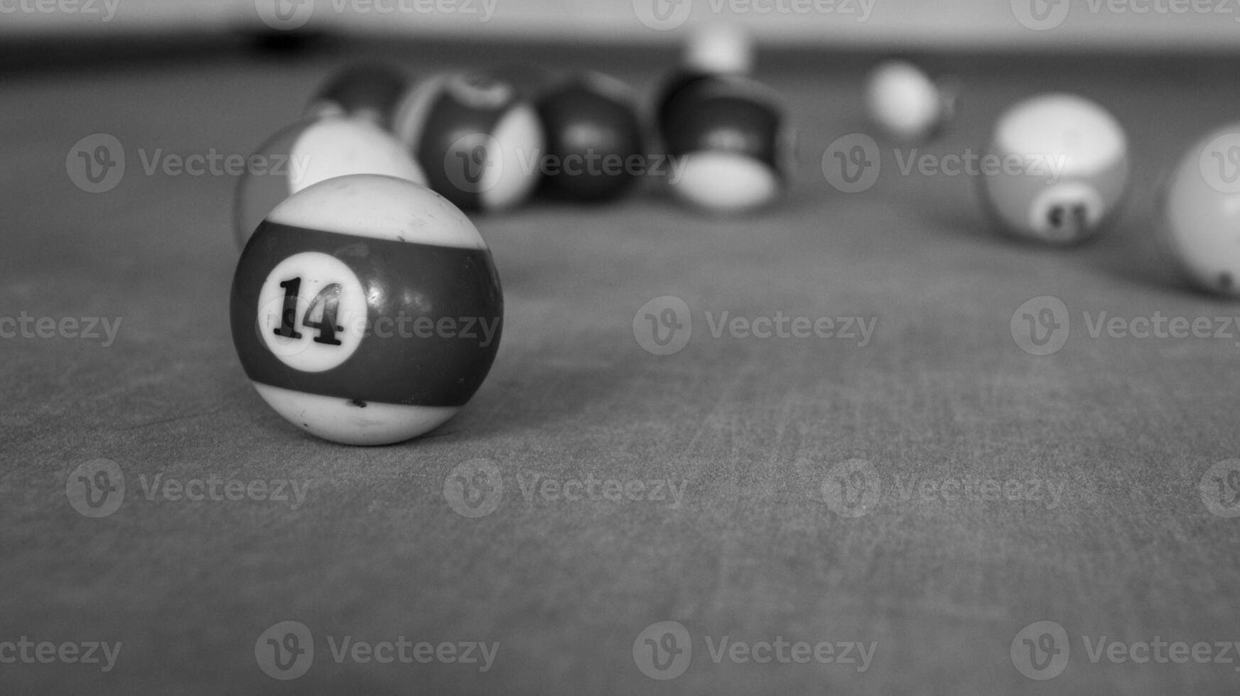 Billiards sports game. Multi-colored billiard balls with numbers on the pool table. Active recreation and entertainment. photo