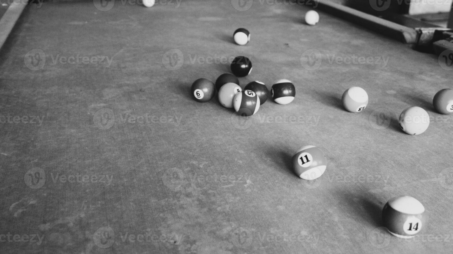 Billiards sports game. Multi-colored billiard balls with numbers on the pool table. Active recreation and entertainment. photo