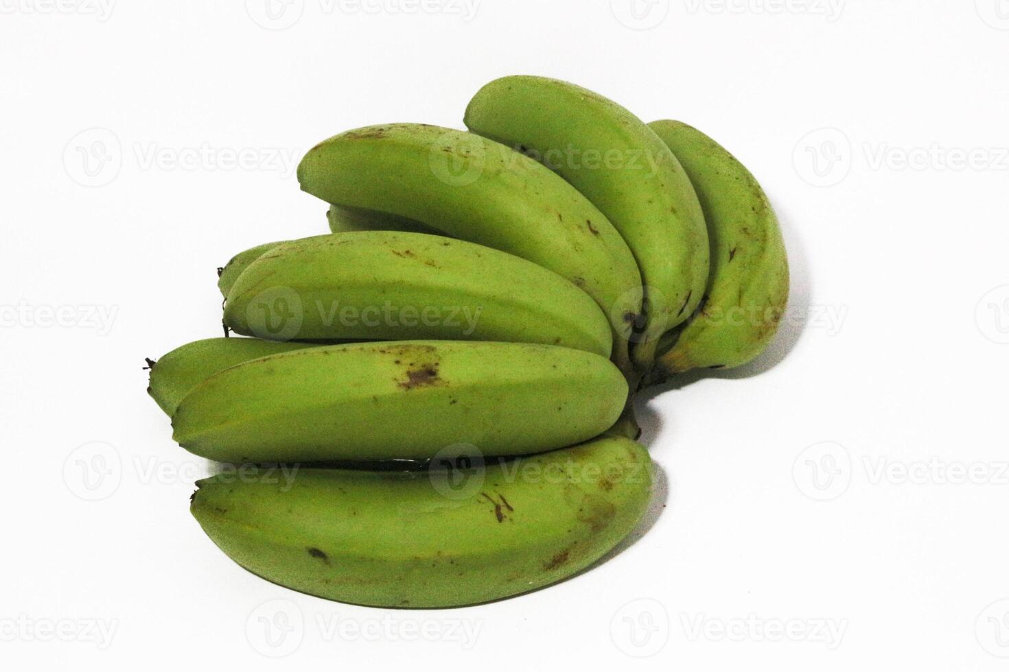 A green banana, after harvest, in a woven bamboo container, panen pisang cavendish, pisang ambon hijau, dari kebun, Ambon bananas, sweet, savory and a little sour, after harvest, rasanya manis gurih photo