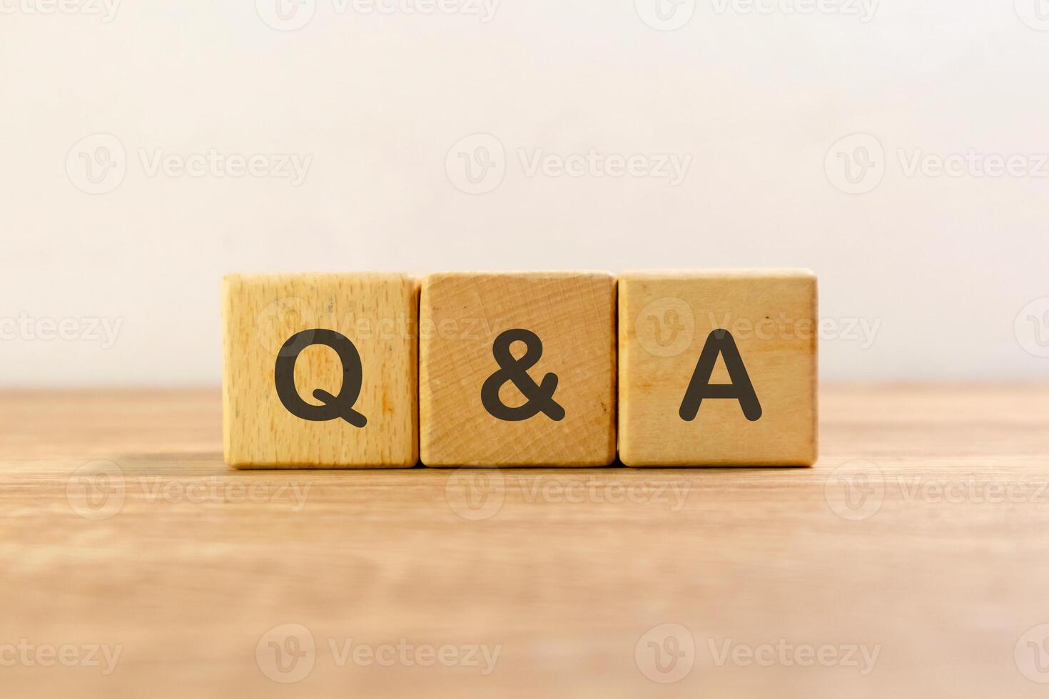 Question and answer or Q and A written on wooden blocks photo