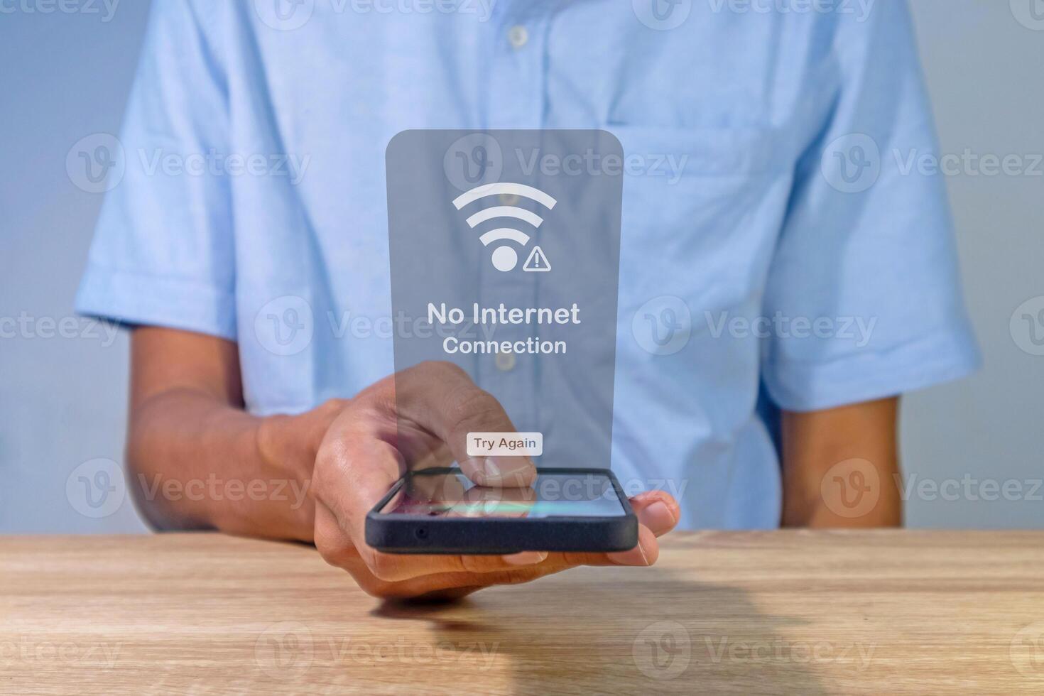 Man using a smartphone with no internet connection on screen. No internet access or bad connection concept. photo