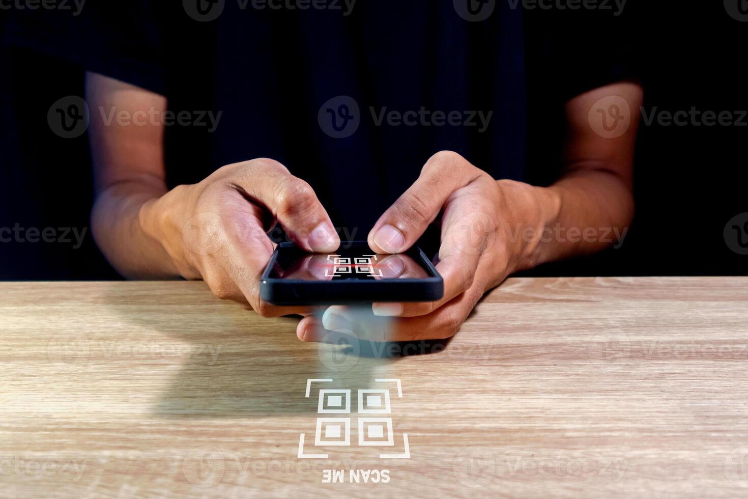 Man using a smartphone to scan QR code. QR code payment, registration, E-wallet or cashless technology concept. photo