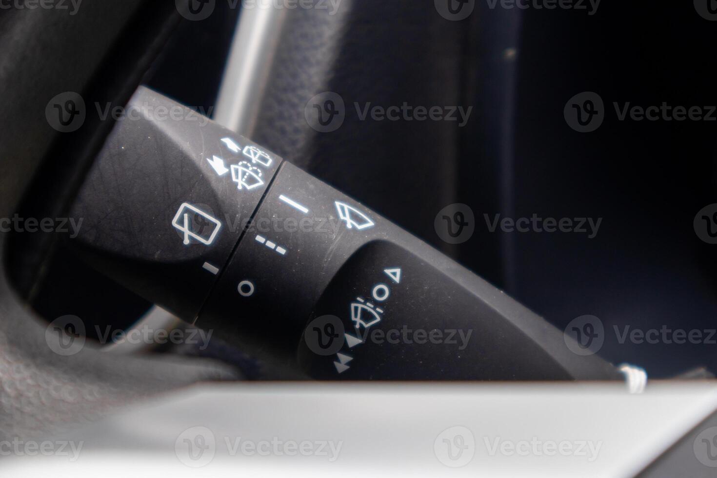 Close up view of car windshield wiper switch control photo