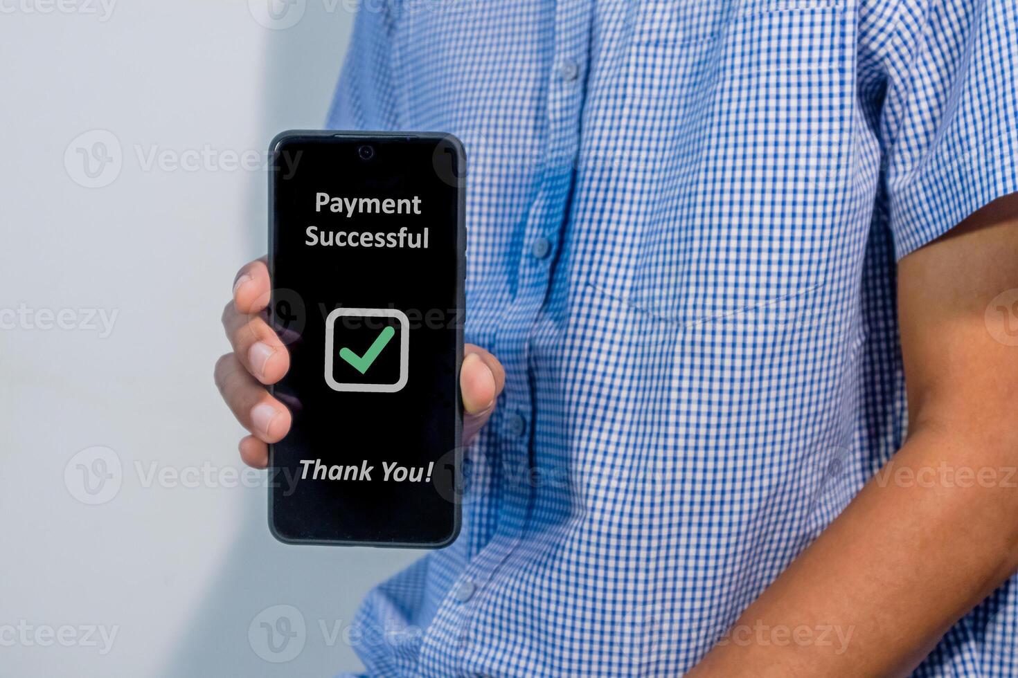 Man making payment for online shopping using a smartphone. Online payment concept. photo