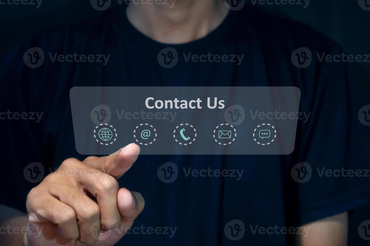A man touching on virtual screen contact icons. Contact us, call center, hotline operator or customer support hotline on virtual screen. photo