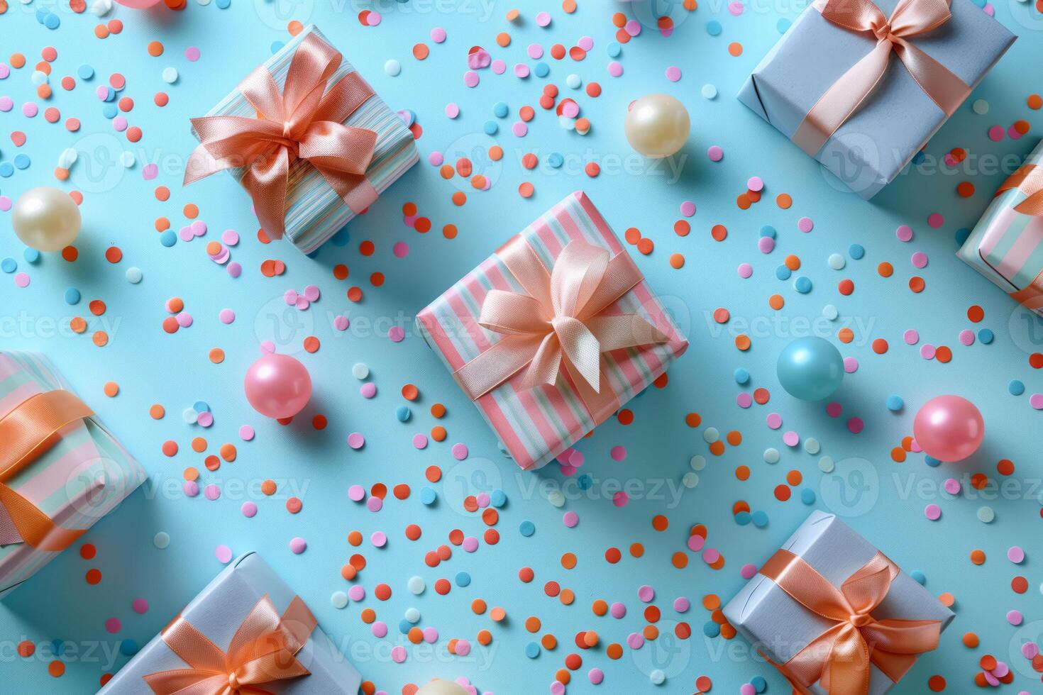 Decorative gifts adorned with ribbons and bows, set against a confetti-filled backdrop photo