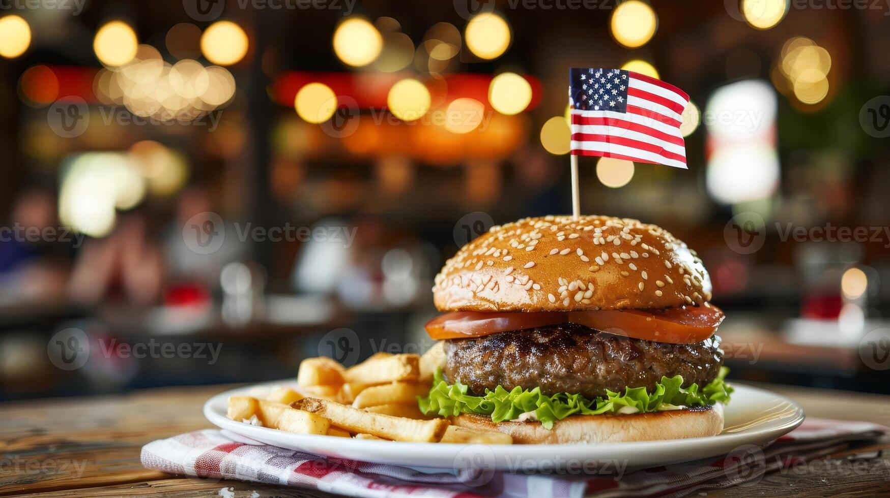 Juicy burger garnished with American flag photo