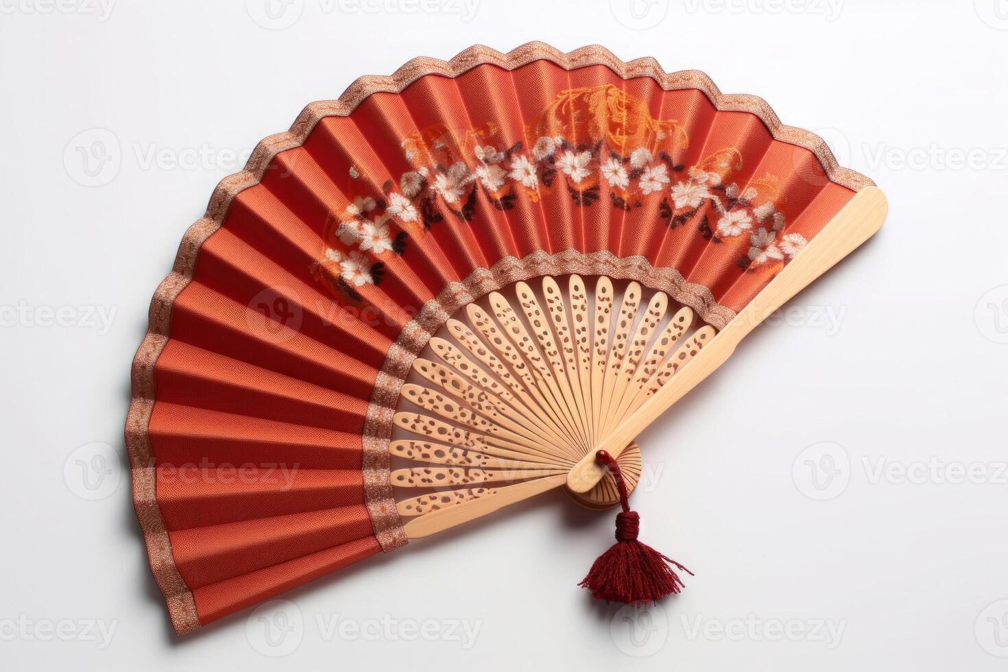 red hand fan isolated on white background. photo