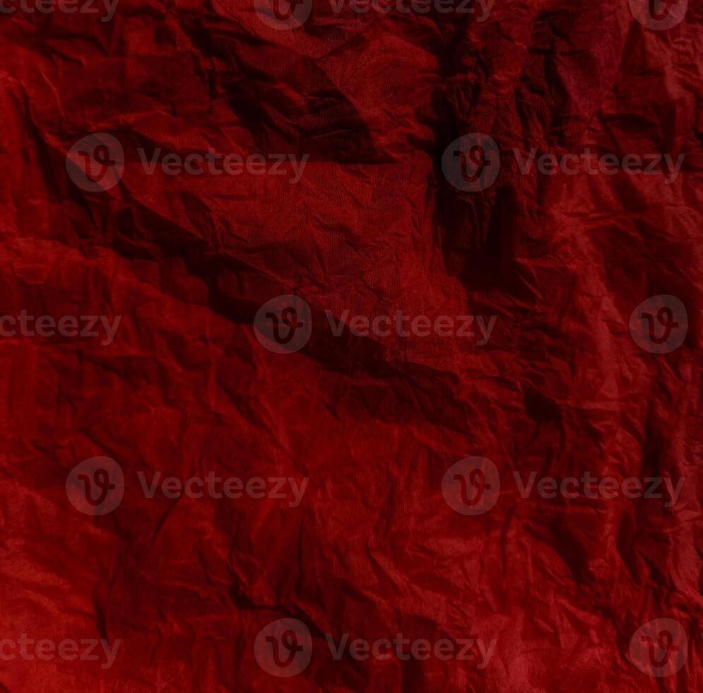 Abstract wrinkled or Free photo crumpled red paperboard or empty canvas or paper surface or fabric stain background.