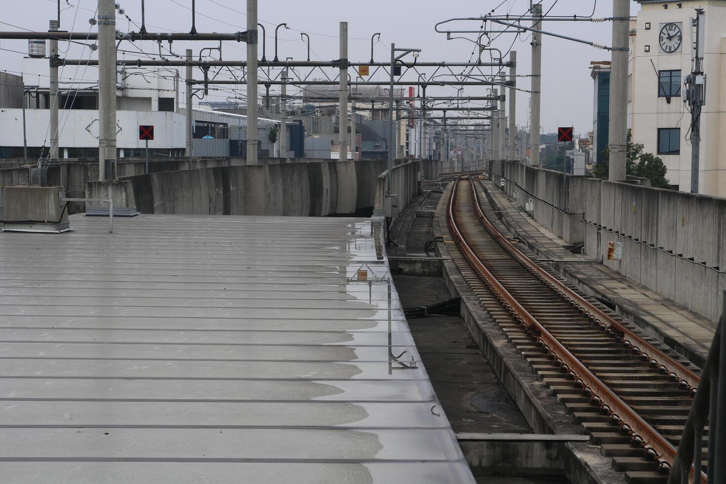 Deserted Train Station on a Rainy Day photo