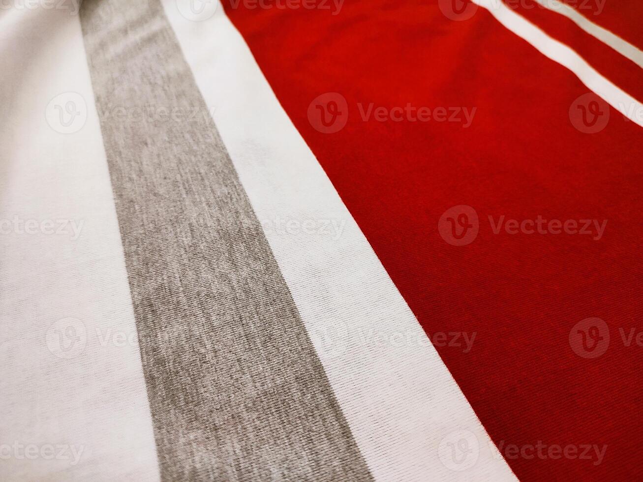 The texture and background of the fabric is white, gray and red photo