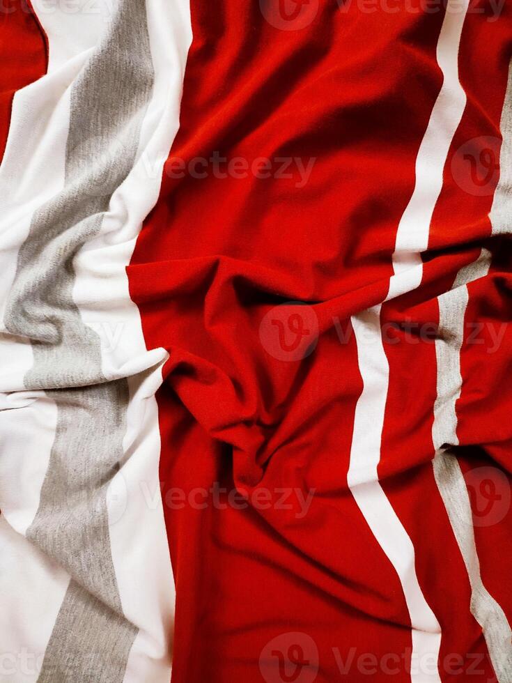 The texture and background of the fabric is white, gray and red photo
