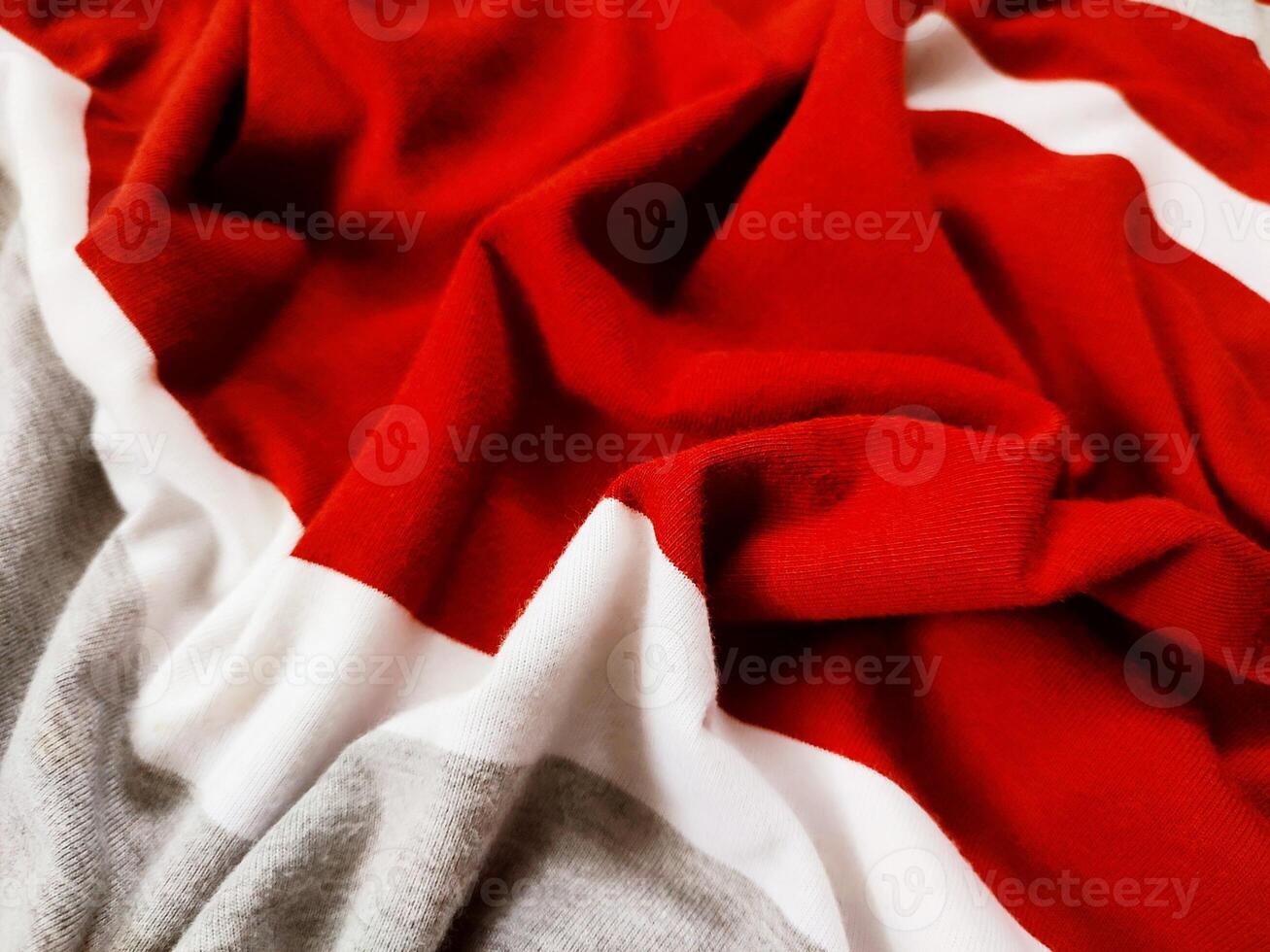 The texture and background of the fabric is white, gray and red photo