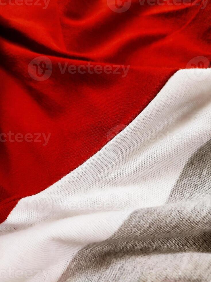 The texture and background of the fabric is white, gray and red photo