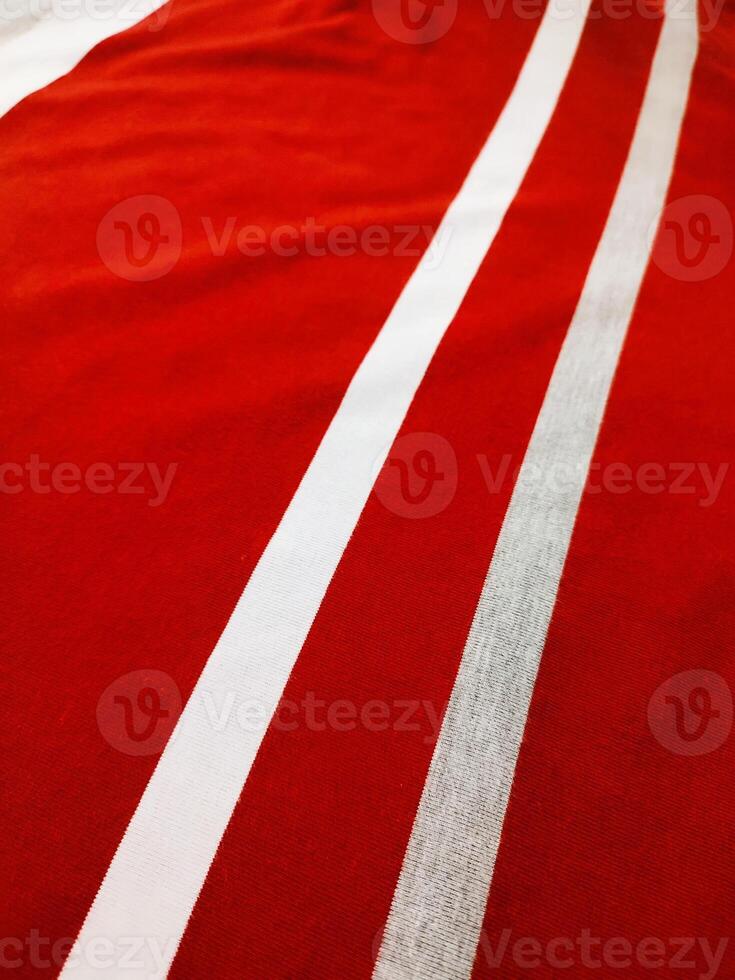 The texture and background of the fabric is white, gray and red photo