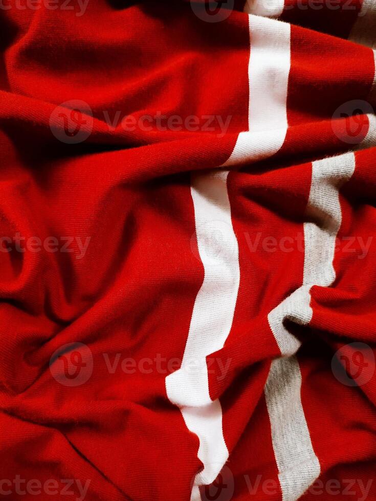 The texture and background of the fabric is white, gray and red photo