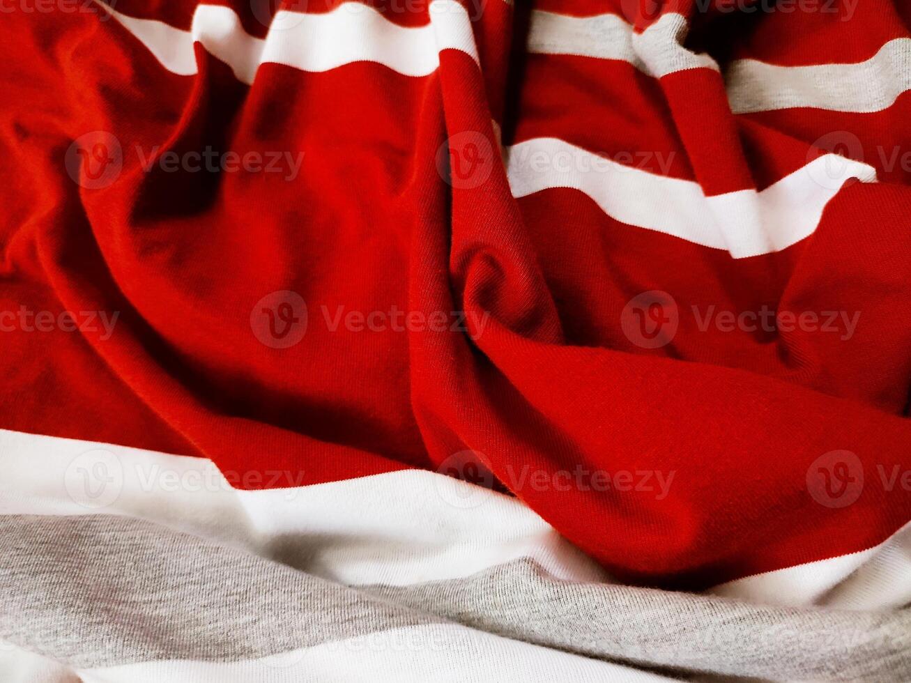 The texture and background of the fabric is white, gray and red photo