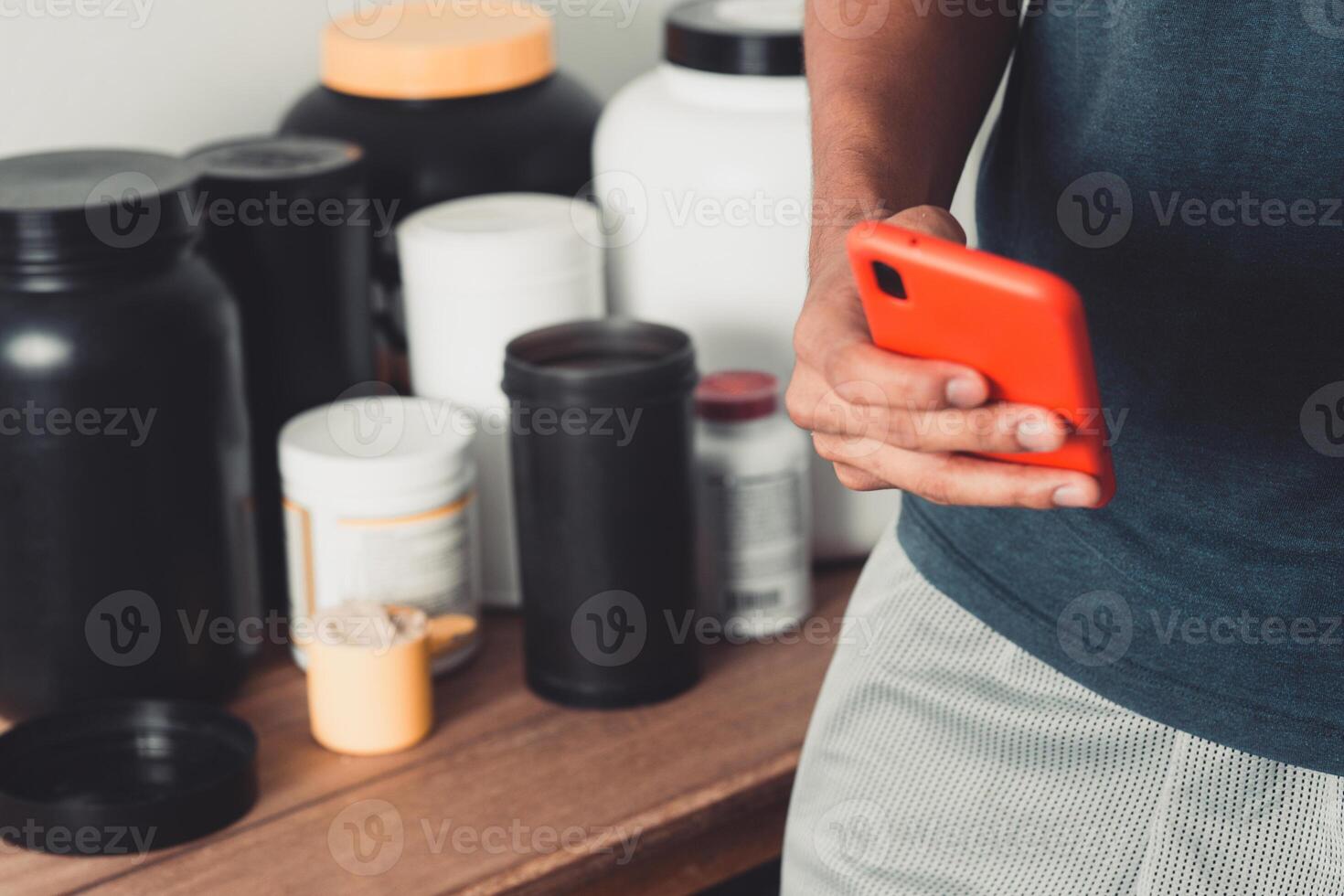 Hands holding a smartphone using nutritional app photo
