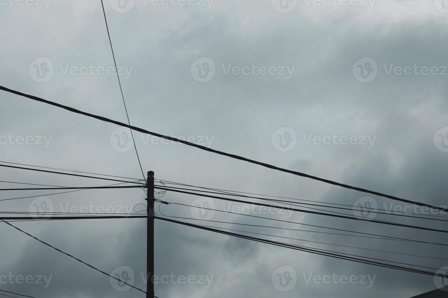 Electricity poles and high voltage power lines photo