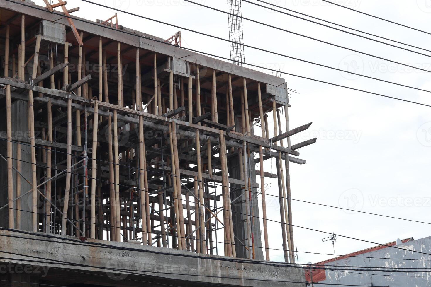 Bamboo scaffolding or crutches in supermarket construction background photo