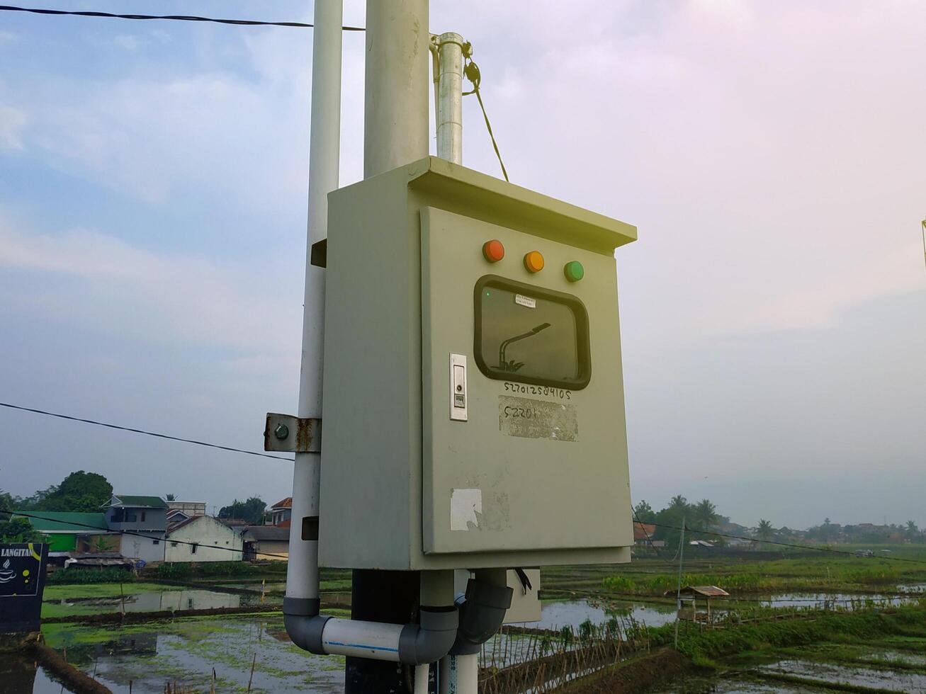 Electrical box attached to a pole photo