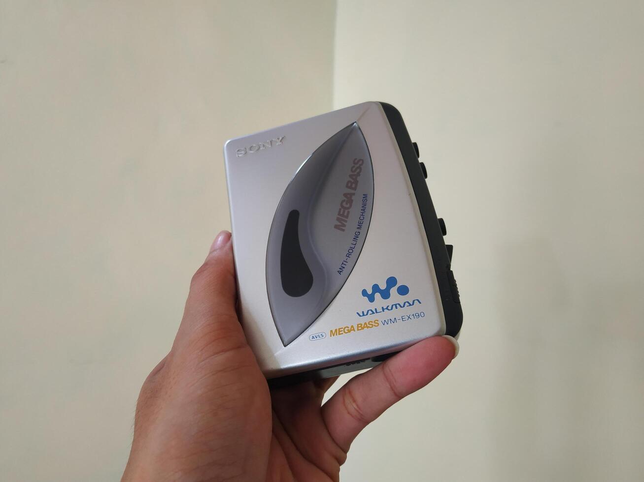 Banyumas, Indonesia - June 11 2024, Hand held Sony brand portable cassette tape player or Walkman. photo