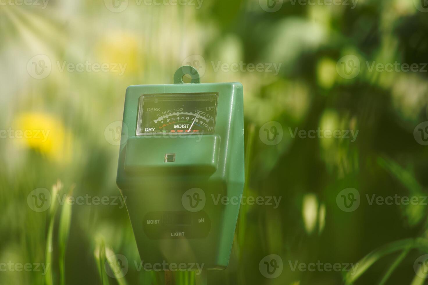 Three way meter PH, light and moisture in the soil photo