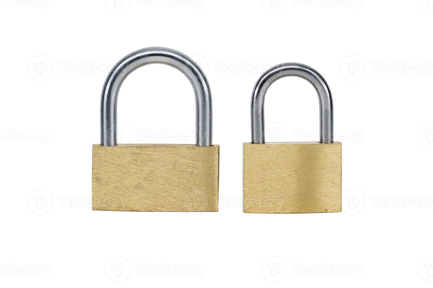 Two shiny gold padlocks isolated on white background photo