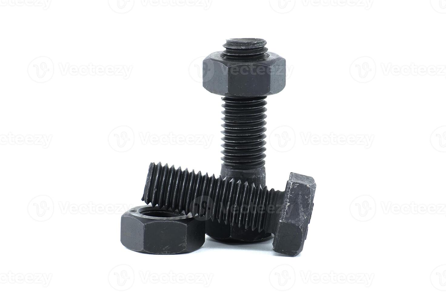 Hexagonal-shaped bolts and nuts isolated on white photo