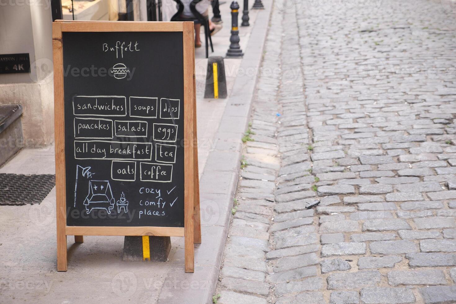 Cafe menu on black board outdoor photo