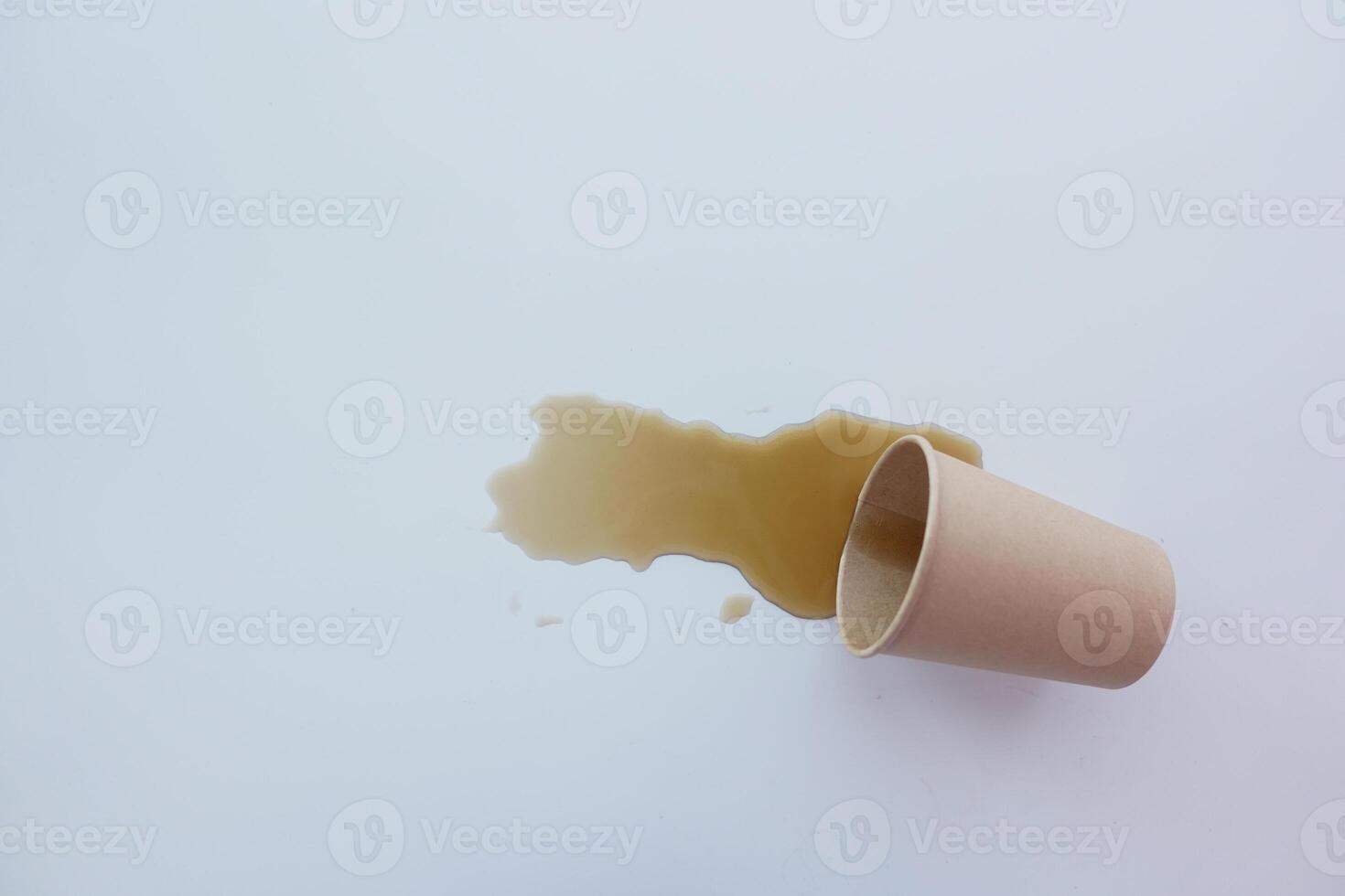 soft drinks or liquid spilled on a white table , photo