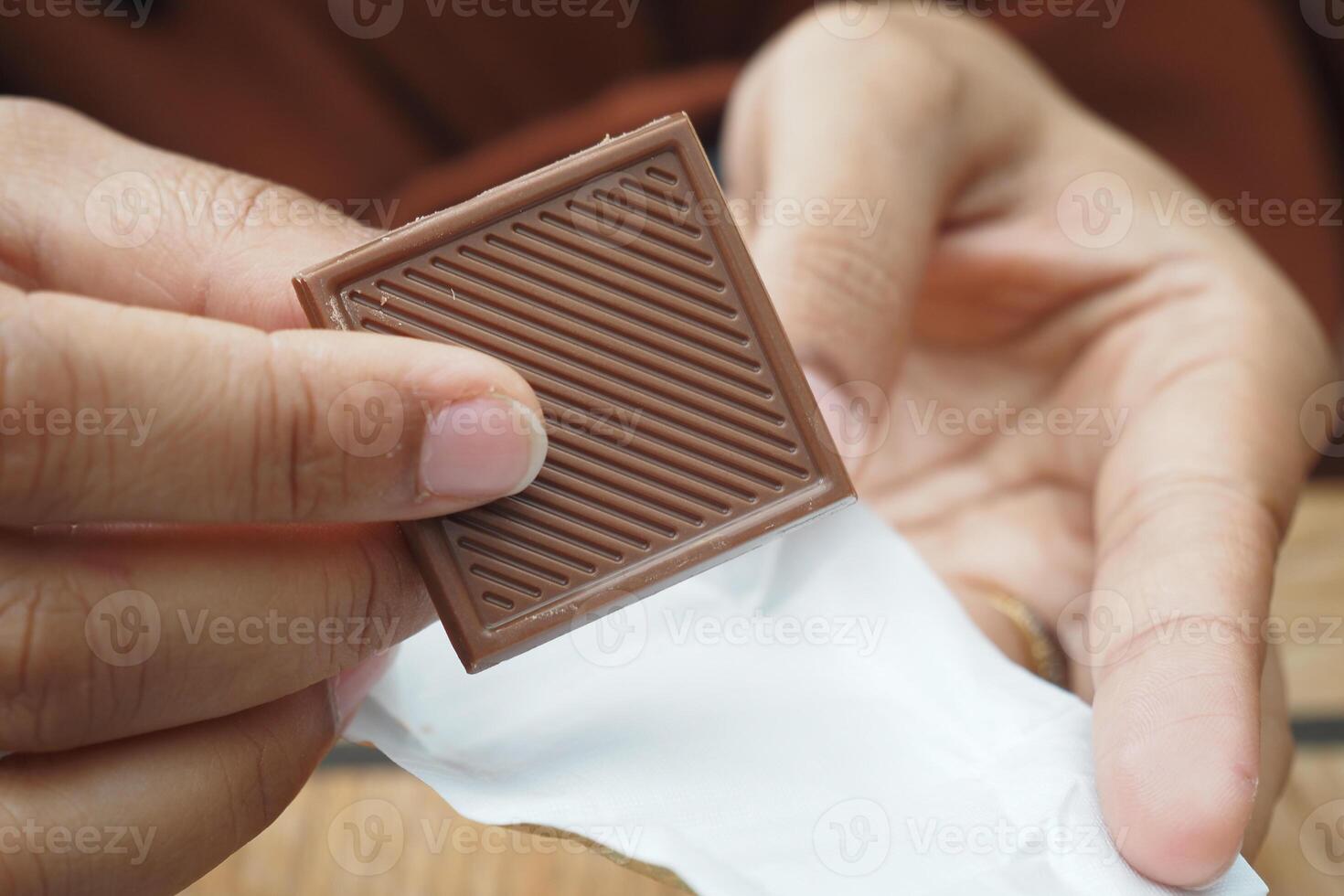 removing packet from a chocolate photo
