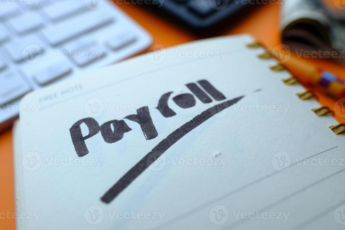 Word writing text Payroll on notepad on color background. photo