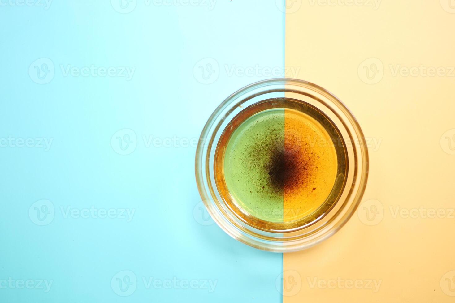Used vegetable oil in a plate . photo