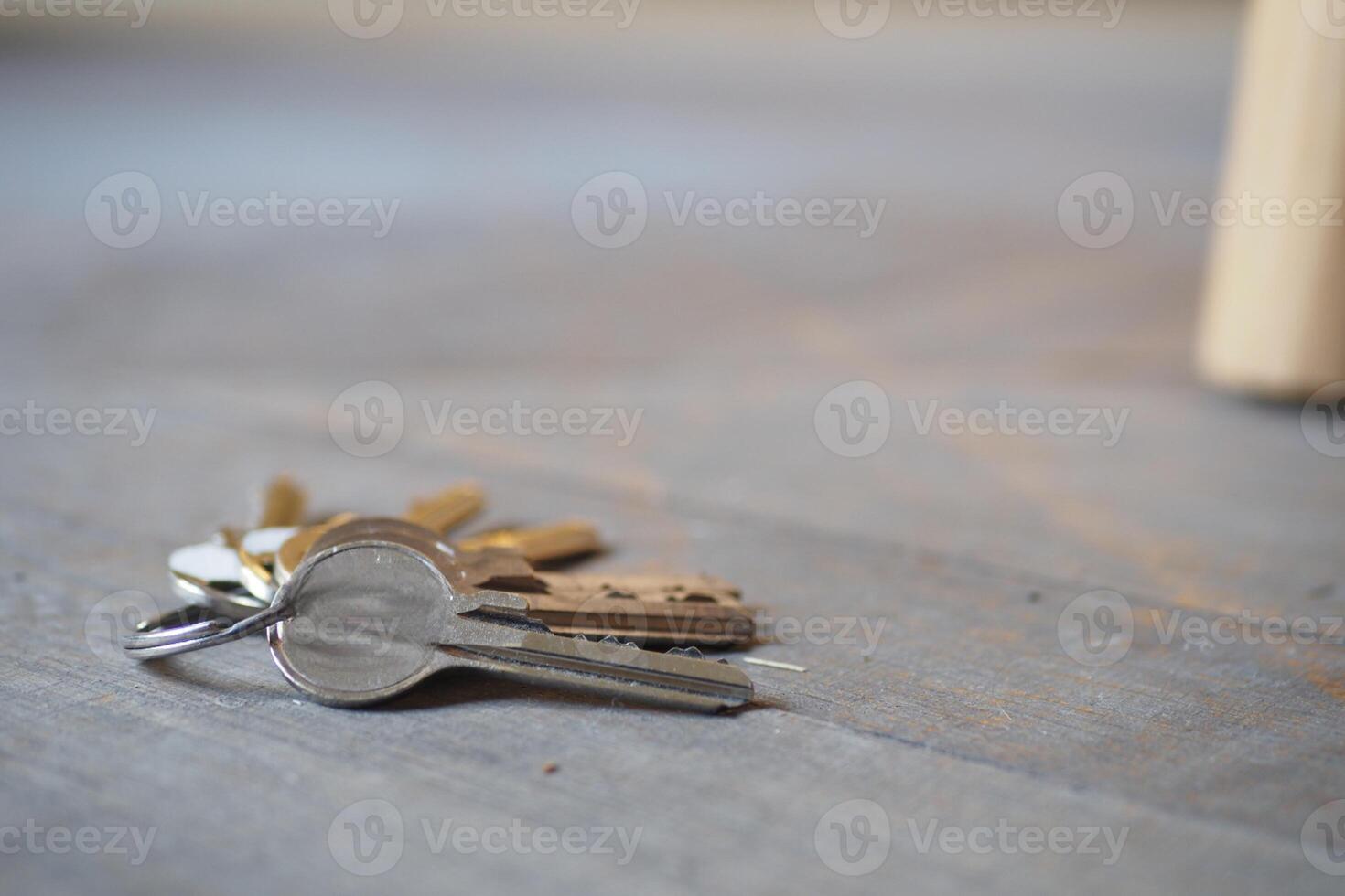 house keys on the ring on table in a room. To forget keys at home concept , photo