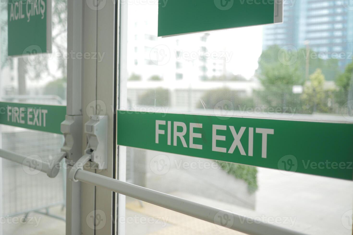 fire exit sign on a door photo