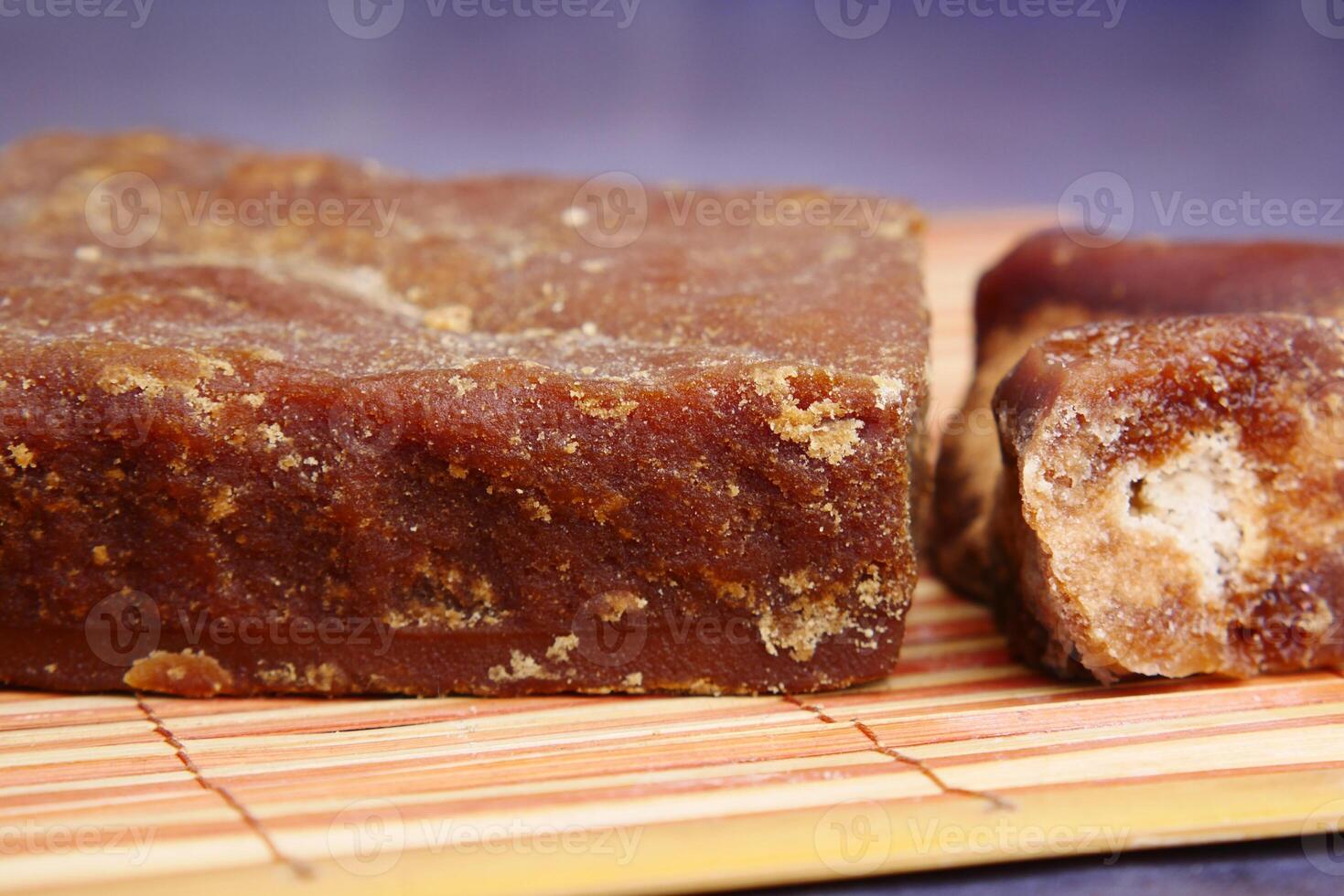 Jaggery traditional cane sugar cube on table photo