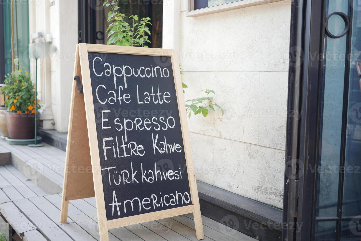 Cafe menu on black board outdoor photo